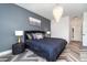 Main bedroom features a luxurious chandelier and a large window at 14346 San Domingo Blvd, Port Charlotte, FL 33981
