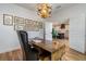 Bright home office featuring wood floors, modern lighting, and built in cabinetry at 14346 San Domingo Blvd, Port Charlotte, FL 33981