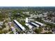 Scenic aerial view of community near lake, with downtown Tampa on the horizon at 5820 43Rd N Ter # 1406, St Petersburg, FL 33709