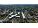 Overhead aerial view of complex featuring manicured landscaping and a cross-shaped building at 5820 43Rd N Ter # 1406, St Petersburg, FL 33709