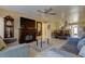Open-concept living room features a fireplace, tile flooring, and a view to dining area at 5820 43Rd N Ter # 1406, St Petersburg, FL 33709