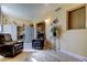 Comfortable room with recliner chairs, natural light, and easy access to other parts of the house at 5820 43Rd N Ter # 1406, St Petersburg, FL 33709