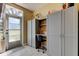 Well-lit office space featuring built-in shelving and cabinets, and natural light at 5820 43Rd N Ter # 1406, St Petersburg, FL 33709