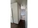 View of a bathroom with a tub, closet, and toilet area at 418 Henderson Ave, Seffner, FL 33584