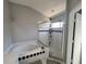 Bathroom showcasing a soaking tub and a glass-enclosed shower, perfect for relaxation at 418 Henderson Ave, Seffner, FL 33584