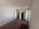 Neutral bedroom with a closet, natural light, and carpeted floors at 418 Henderson Ave, Seffner, FL 33584