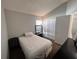 Neutral bedroom showcasing vaulted ceilings and carpeted floors at 418 Henderson Ave, Seffner, FL 33584