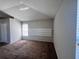 Bedroom featuring neutral paint, plush carpet and natural light from large window at 418 Henderson Ave, Seffner, FL 33584