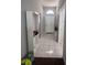 Bright entryway featuring ceramic tile flooring and a decorative arched window above the door at 418 Henderson Ave, Seffner, FL 33584