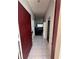 Inviting foyer featuring tile flooring and a glimpse into the living area at 418 Henderson Ave, Seffner, FL 33584