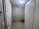 Functional laundry room ready for washer and dryer installation at 418 Henderson Ave, Seffner, FL 33584