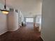 Spacious living room with neutral tones and lots of natural light at 418 Henderson Ave, Seffner, FL 33584