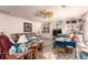 Comfortable living room features neutral decor, built-in shelving, and large windows for natural light at 181 Sportsman Rd, Rotonda West, FL 33947