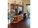 Spacious living room with hardwood floors and a large entertainment center at 4041 Murfield E Dr, Bradenton, FL 34203
