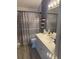 This bathroom has a single sink vanity with drawers for storage at 4749 Stoneview Cir, Oldsmar, FL 34677