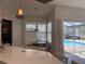 Eat-in kitchen area looking out to pool at 4749 Stoneview Cir, Oldsmar, FL 34677