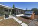 Backyard with patio, chicken coop, barbeque and stepping stones to the screened patio at 7226 13Th N St, St Petersburg, FL 33702