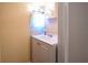 Small bathroom featuring a single sink vanity, a mirror, a shower/bath combo, and neutral paint at 7226 13Th N St, St Petersburg, FL 33702