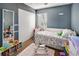 Charming bedroom with a playful décor and closet for storage at 7226 13Th N St, St Petersburg, FL 33702