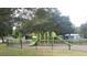 Community playground featuring a variety of play structures and slides, perfect for outdoor fun at 7226 13Th N St, St Petersburg, FL 33702
