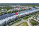 Scenic aerial view of condos near the waterfront and marina in a vibrant community at 603 Bahia Beach Blvd, Ruskin, FL 33570