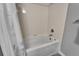 A clean, well-maintained bathtub with white tiling, perfect for relaxation and comfort at 603 Bahia Beach Blvd, Ruskin, FL 33570