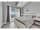 Serene bedroom with vaulted ceilings, a balcony and an anchor decoration at 603 Bahia Beach Blvd, Ruskin, FL 33570
