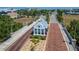 Quaint community entrance with lush landscaping and charming architectural details at 603 Bahia Beach Blvd, Ruskin, FL 33570