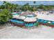 Aerial view of bayside restaurant with multiple seating areas, outdoor patios, and beautiful waterfront location at 603 Bahia Beach Blvd, Ruskin, FL 33570