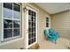 Inviting front porch with seating and sun design floor mat at 603 Bahia Beach Blvd, Ruskin, FL 33570