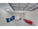 Spacious garage interior for storage of recreational equipment and home maintenance at 603 Bahia Beach Blvd, Ruskin, FL 33570