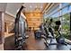 Spacious gym area with modern fitness equipment, large windows, and plenty of natural light at 603 Bahia Beach Blvd, Ruskin, FL 33570