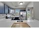 Modern kitchen featuring stainless steel appliances, lots of counter space and bright, natural light at 603 Bahia Beach Blvd, Ruskin, FL 33570