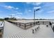 Beautifully constructed pier featuring benches, providing a relaxing spot with a stunning waterfront view at 603 Bahia Beach Blvd, Ruskin, FL 33570