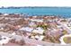 This coastal home offers stunning views of the water, a nearby beach, and city skyline at 855 Boca Ciega Isle Dr, St Pete Beach, FL 33706