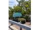 Welcoming sign for Boca Ciega Isle, amidst lush greenery and beautiful surroundings at 855 Boca Ciega Isle Dr, St Pete Beach, FL 33706