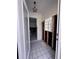 Entryway features tile flooring, glass block window, and open access to other rooms for easy flow at 855 Boca Ciega Isle Dr, St Pete Beach, FL 33706