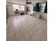 Spacious room with tile flooring and lots of natural light, ready for renovation and customization at 855 Boca Ciega Isle Dr, St Pete Beach, FL 33706