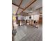 Renovation in progress showing open living space with tile floors and partially finished kitchen at 855 Boca Ciega Isle Dr, St Pete Beach, FL 33706