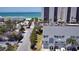 Aerial view of light blue townhouses and the Gulf of Mexico at 900 Harbour House Dr, Indian Rocks Beach, FL 33785