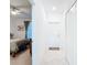 Hallway that leads into a bedroom with a ceiling fan, closet, and a window at 14204 Heritage Landing Blvd # 714, Punta Gorda, FL 33955