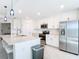 Modern kitchen with stainless steel appliances, ample cabinets, and a large island at 14204 Heritage Landing Blvd # 714, Punta Gorda, FL 33955