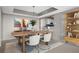 Staged dining area with modern furnishings, stylish decor, and easy access to the kitchen at 3211 W Swann Ave # 808, Tampa, FL 33609
