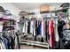 Walk-in closet with metal shelving, rods, and designated space for shoes and accessories at 4301 Hudson Ln, Tampa, FL 33618