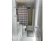 Cozy bathroom features vanity, toilet, tub and shower, as well as a striped curtain at 3124 Pond Hollow St # 183, Wesley Chapel, FL 33543