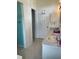 Bright bathroom featuring dual sinks and a toilet area at 3124 Pond Hollow St # 183, Wesley Chapel, FL 33543