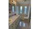 Bathroom with a tub, and dual sinks at 3124 Pond Hollow St # 183, Wesley Chapel, FL 33543