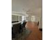 Dining room with hardwood floors, a dining table set, and plenty of light at 3124 Pond Hollow St # 183, Wesley Chapel, FL 33543