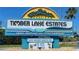 Community sign for Timber Lake Estates, a deed restricted condominium community at 3124 Pond Hollow St # 183, Wesley Chapel, FL 33543