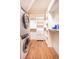 This walk-in closet has a laundry, shelving and drawers at 5169 Oxford Dr, Sarasota, FL 34242